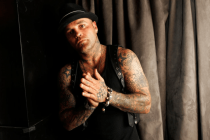 Shifty Shellshock performing on stage, embodying his dynamic and charismatic presence.