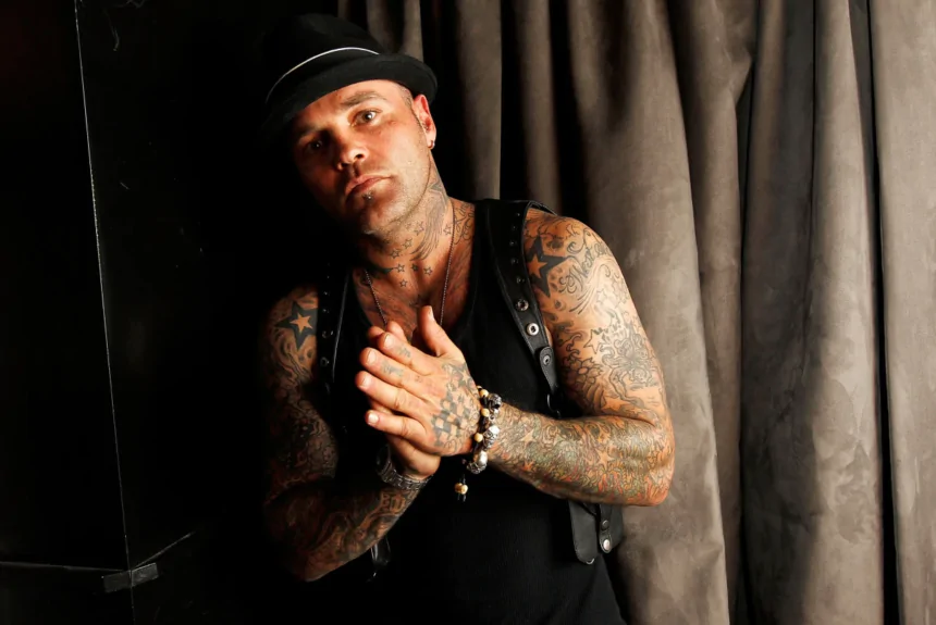 Shifty Shellshock performing on stage, embodying his dynamic and charismatic presence.